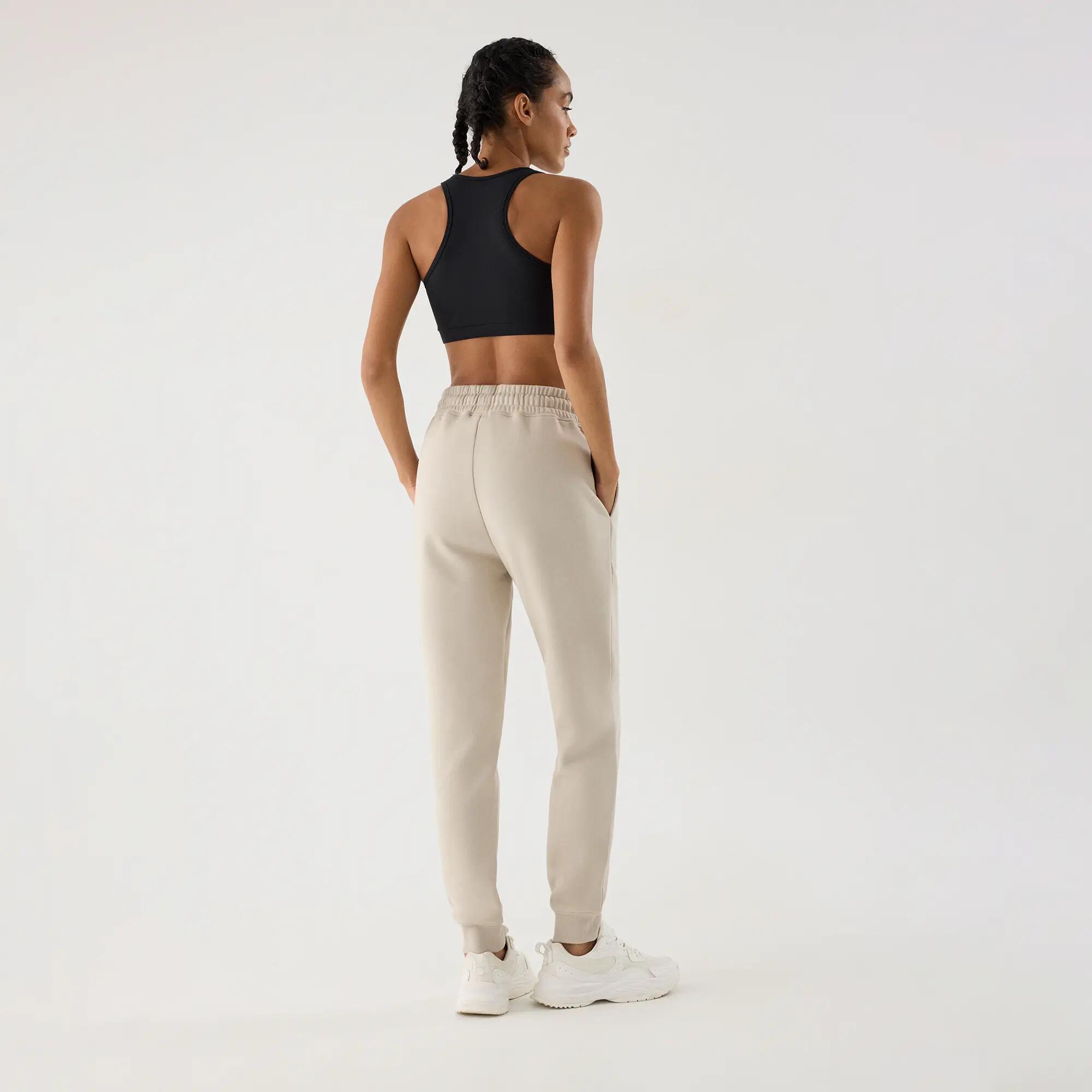 Calças jogger desportivas de mulher bege com cintura ajustável 2/5