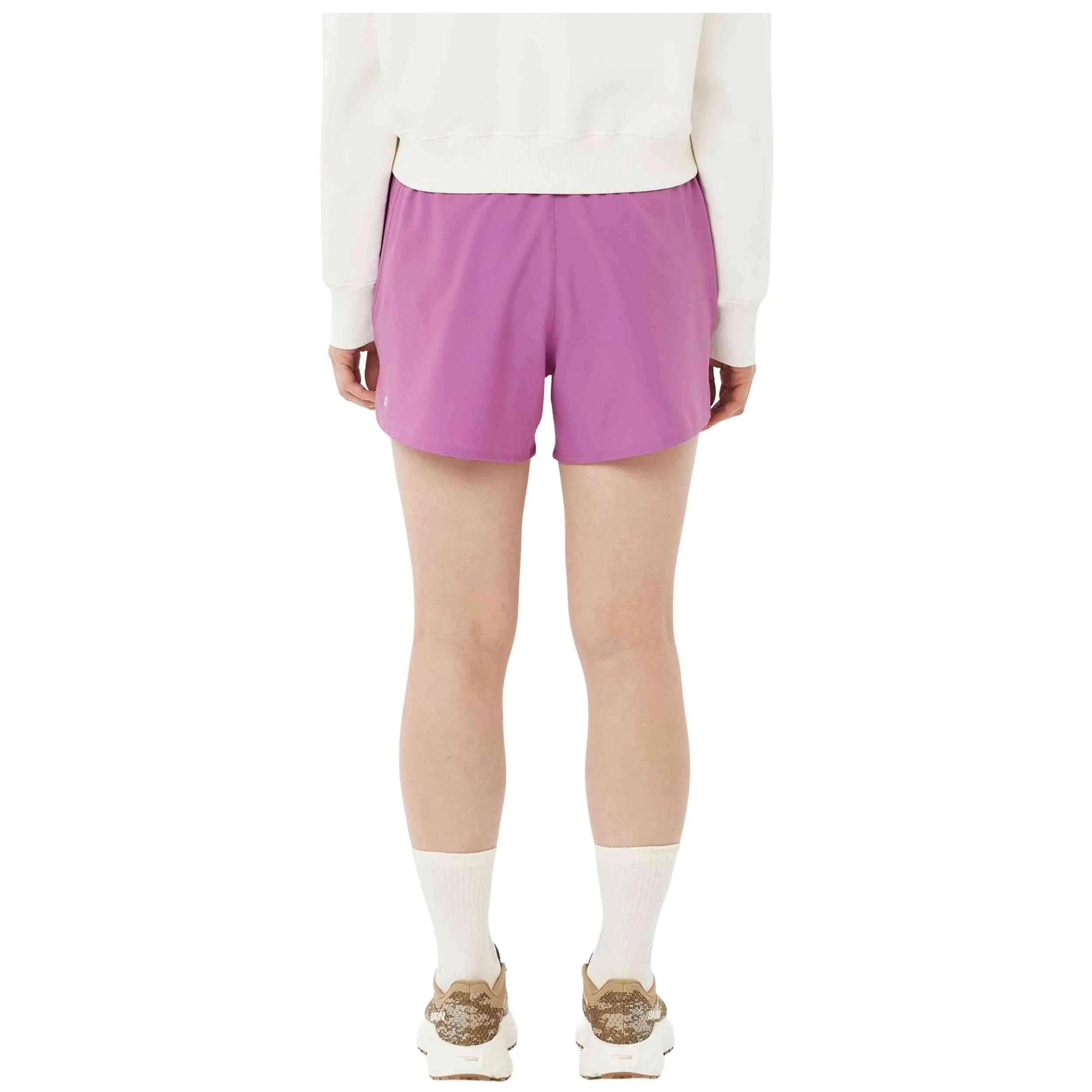 Calções Salomon modelo Shakeout Core 4 para mulheres 4/5