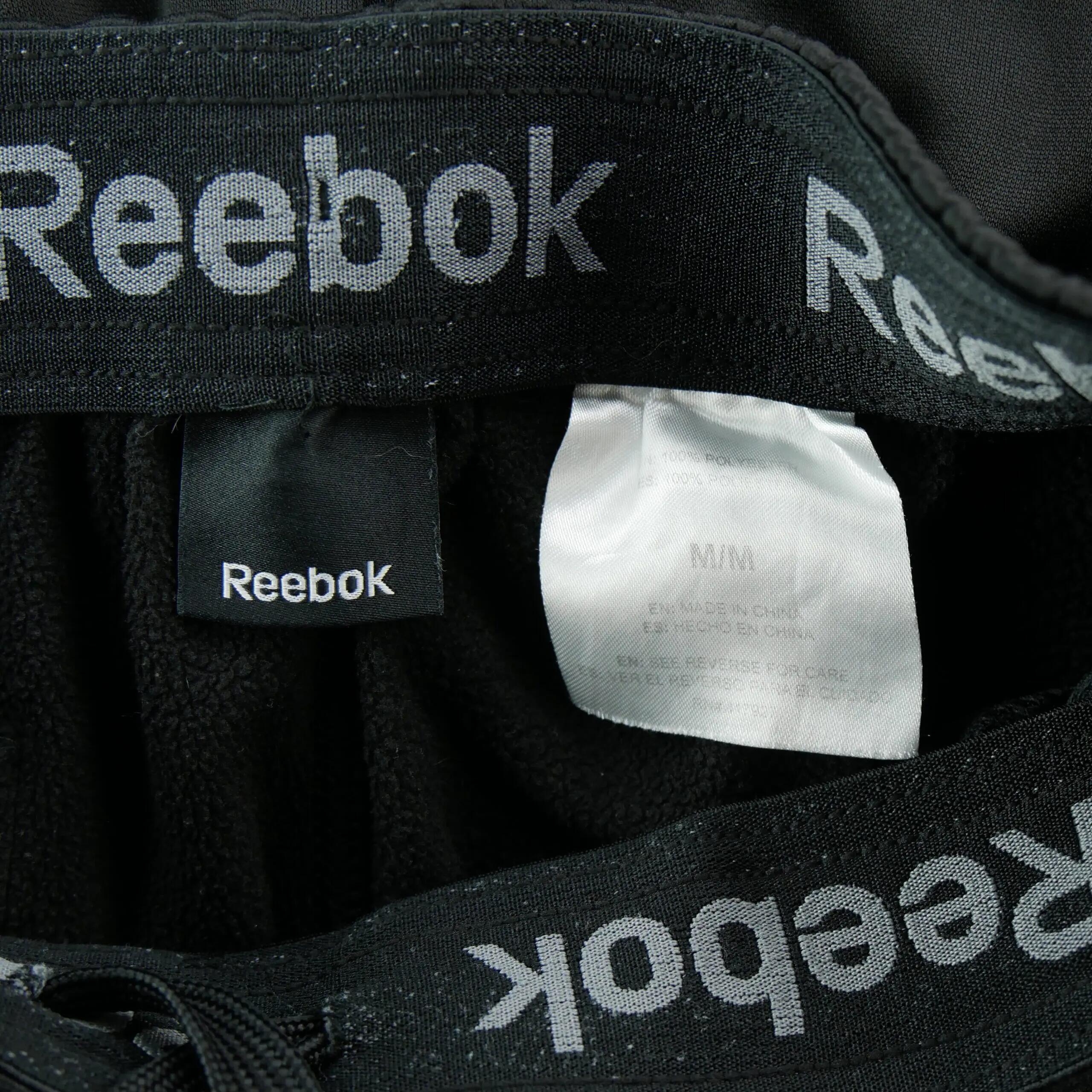 Heren joggingbroek met ritszak op het dijbeen zwart 7/7