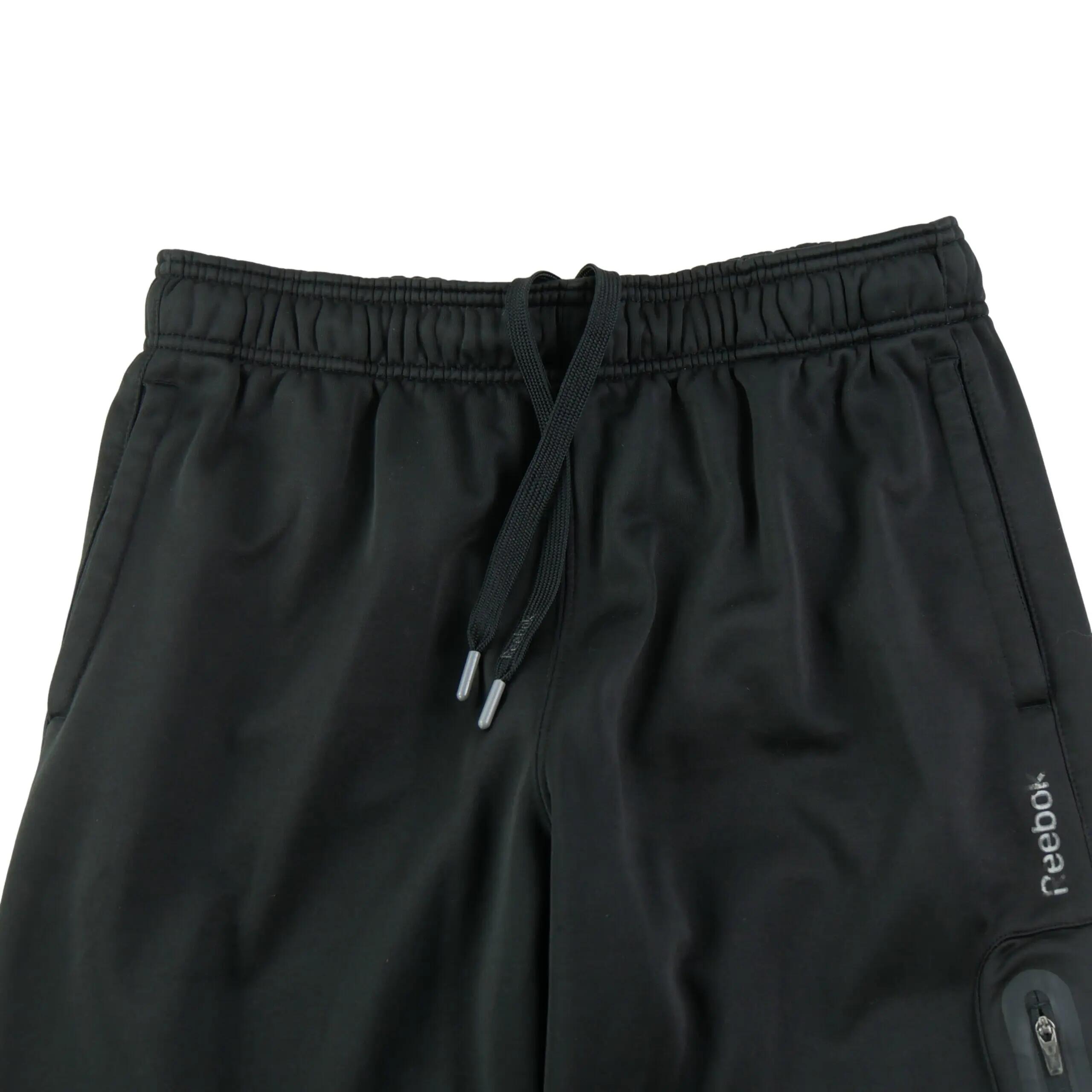 Heren joggingbroek met ritszak op het dijbeen zwart 3/7