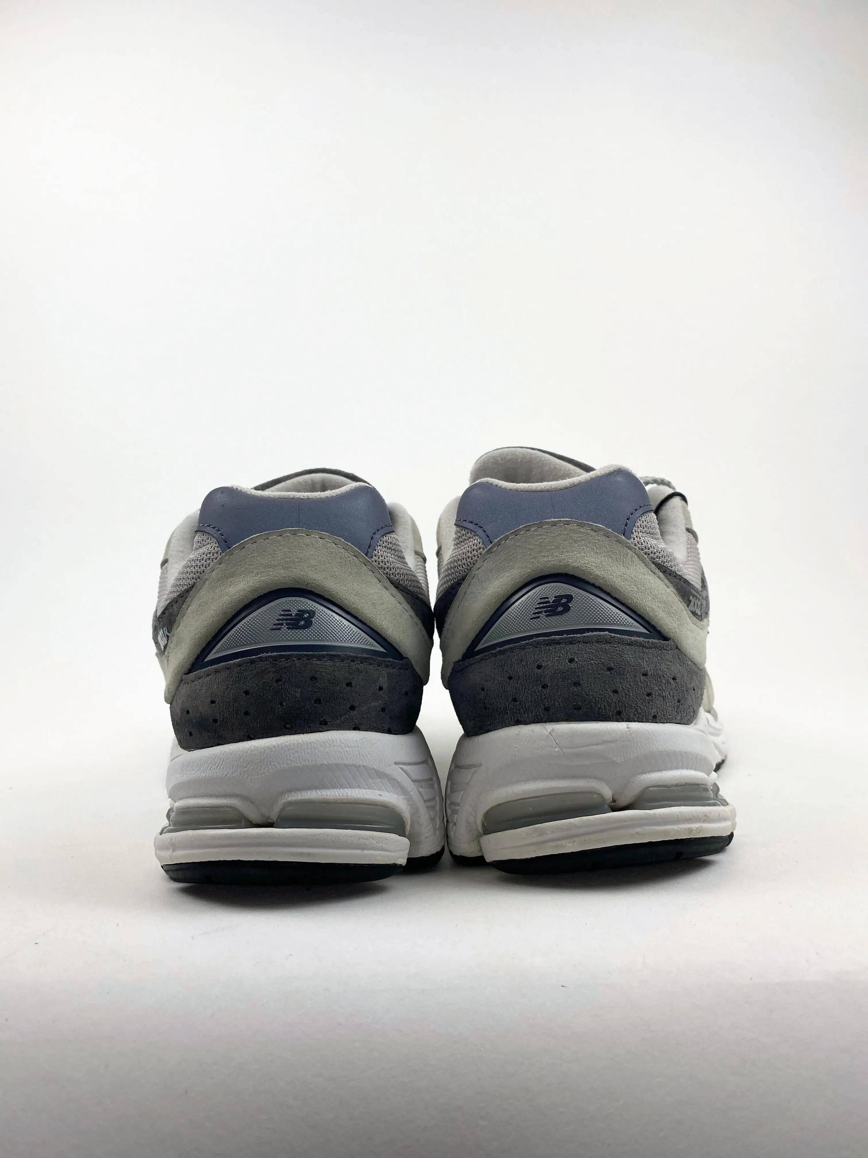 Reconditionné NEW BALANCE Baskets Homme, 2002R, Gris foncé Très Bon État 3/4