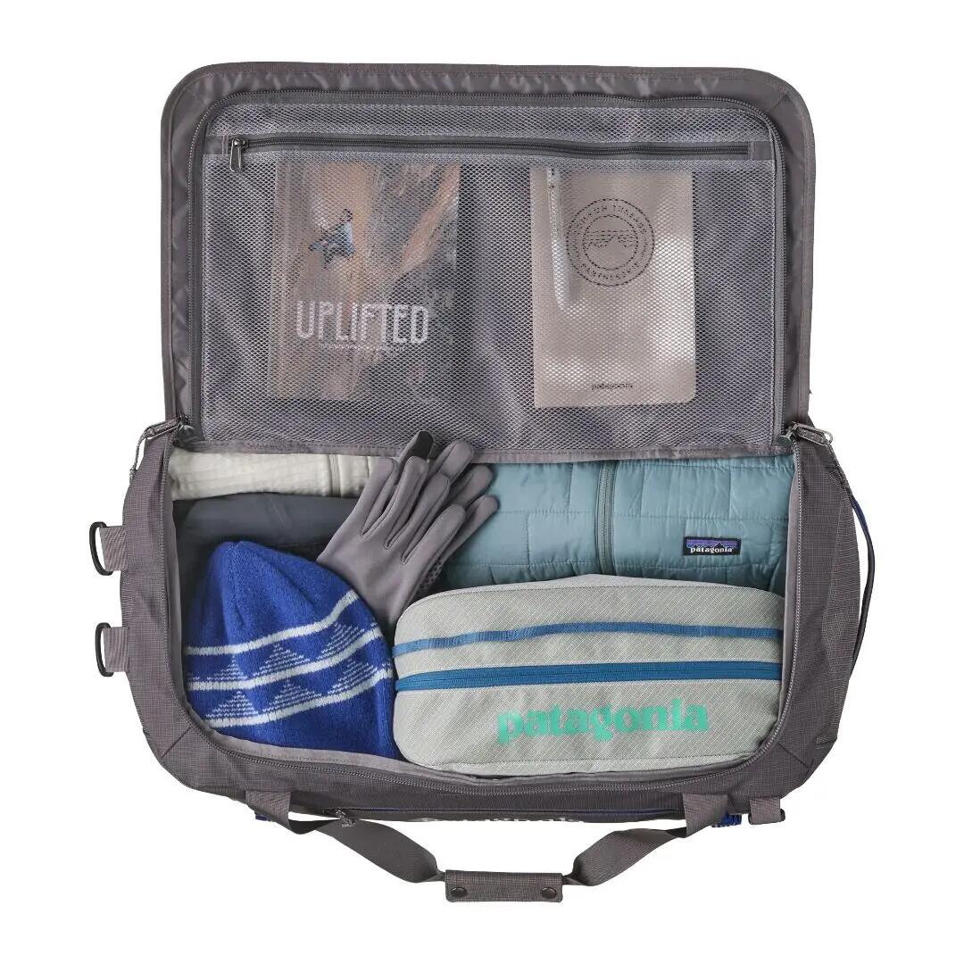 Bolsa Gris Patagonia Hole® Duffel 55L Hut Tripper: May Grey con Base Acolchada 3/4