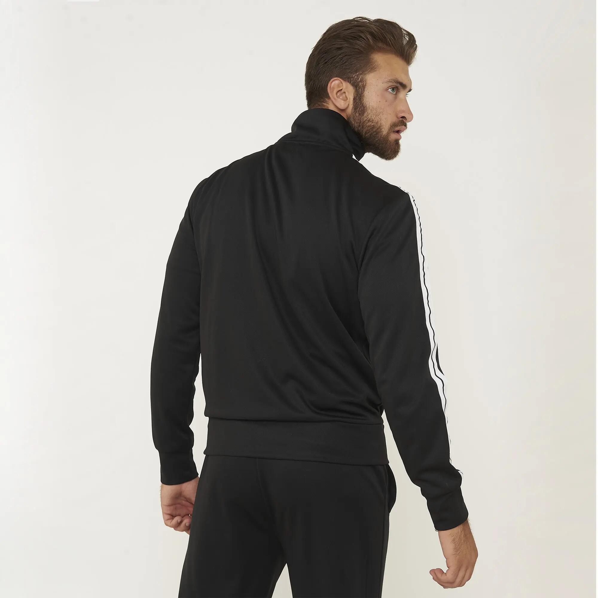 Chándal hombre Universal + Stellar Negro / Blanco 4/8