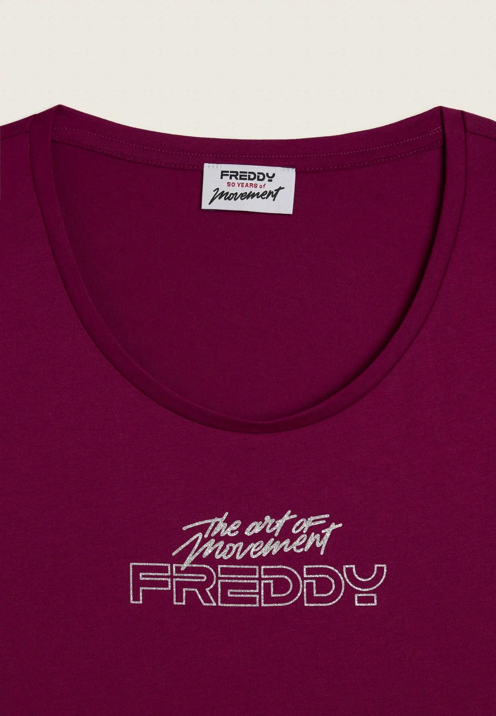 Set met T-shirt en broek “The Art of Movement” 7/8