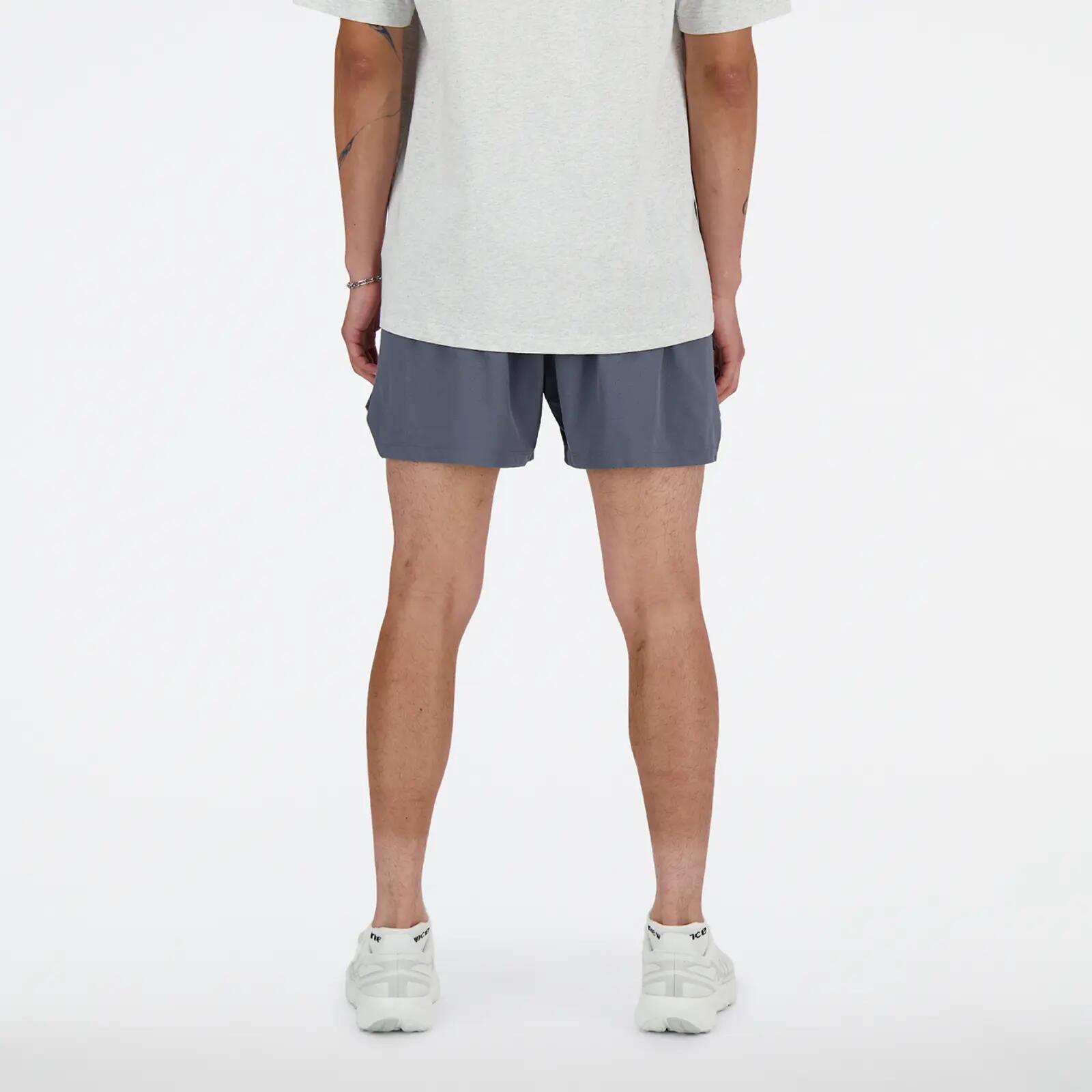 Korte broek New Balance model MS41286_GT voor unisex 6/7