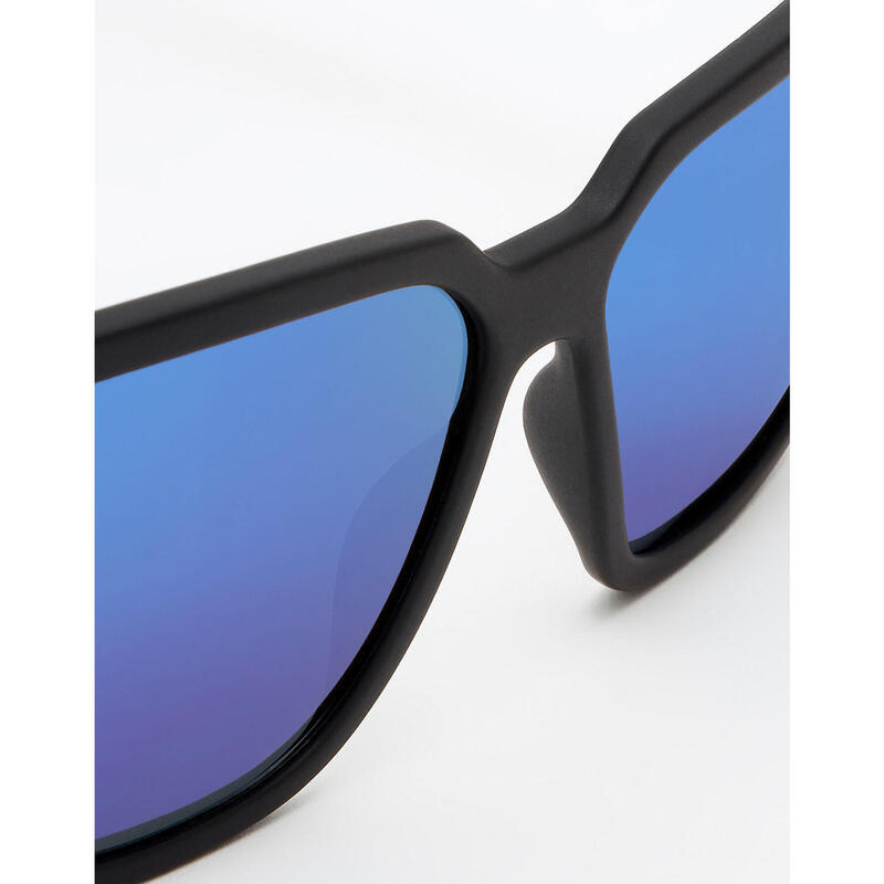 HAWKERS · Gafas de sol MOTION para hombre y mujer · CARBON BLACK:  : Moda