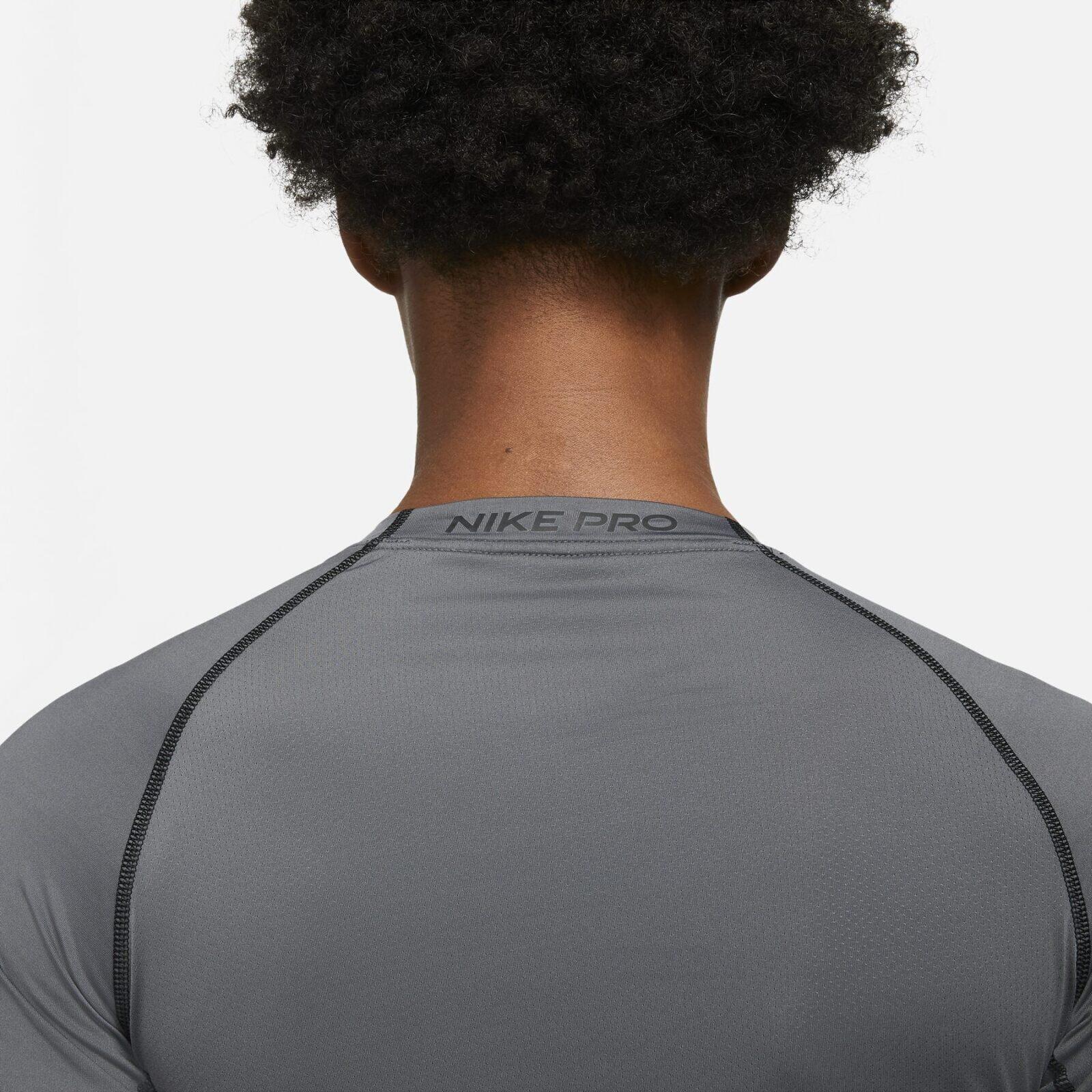 Maglie maniche lunghe da palestra uomo nike grigio 4/5