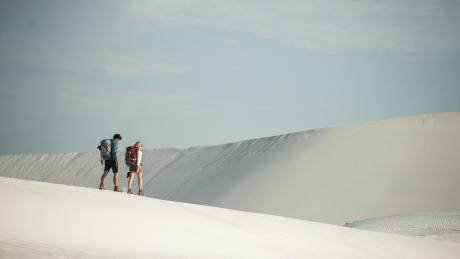 desert-trekking-couple desert-trekking-couple
