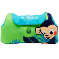 Green child's TISWIM adaptable armband-waistbands printed "MONKEY"