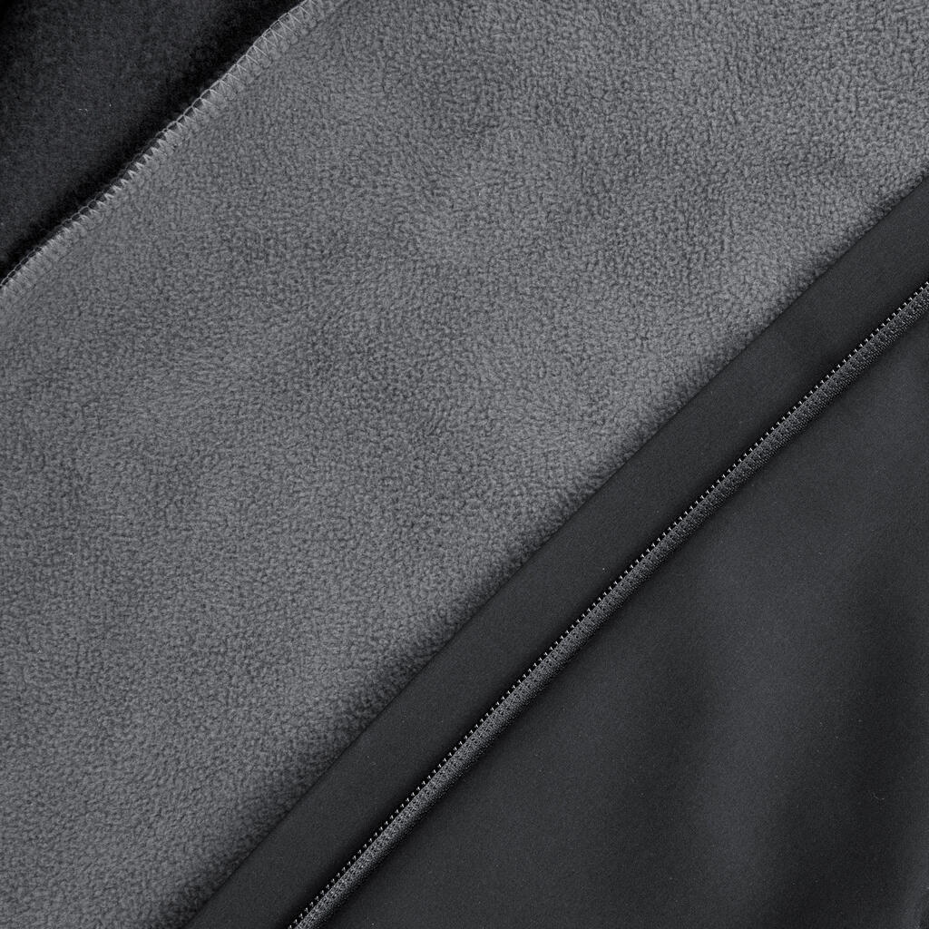 Dámska vetruvzdorná softshellová bunda na turistiku MT500 Windwarm čierna