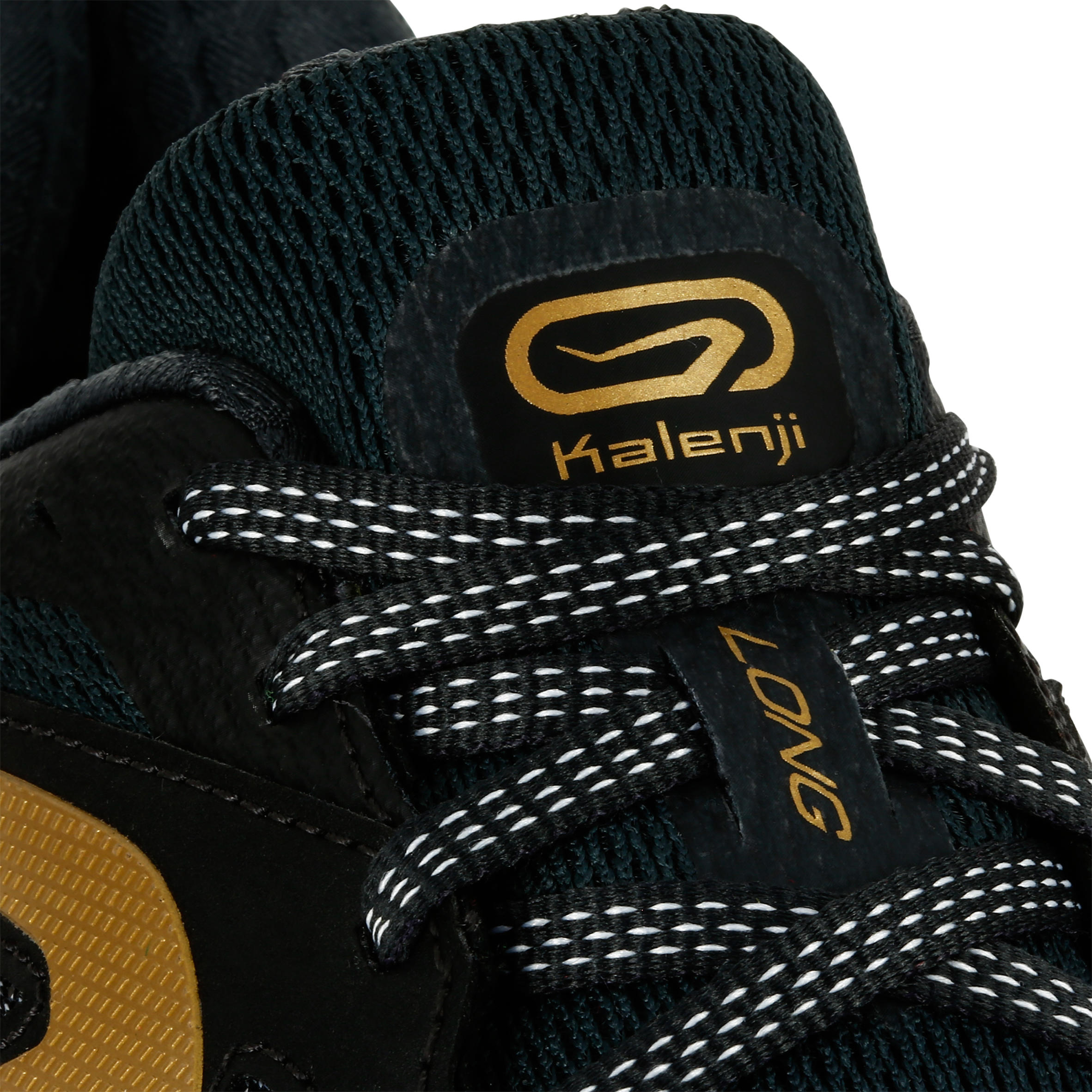 gold and black running shoes