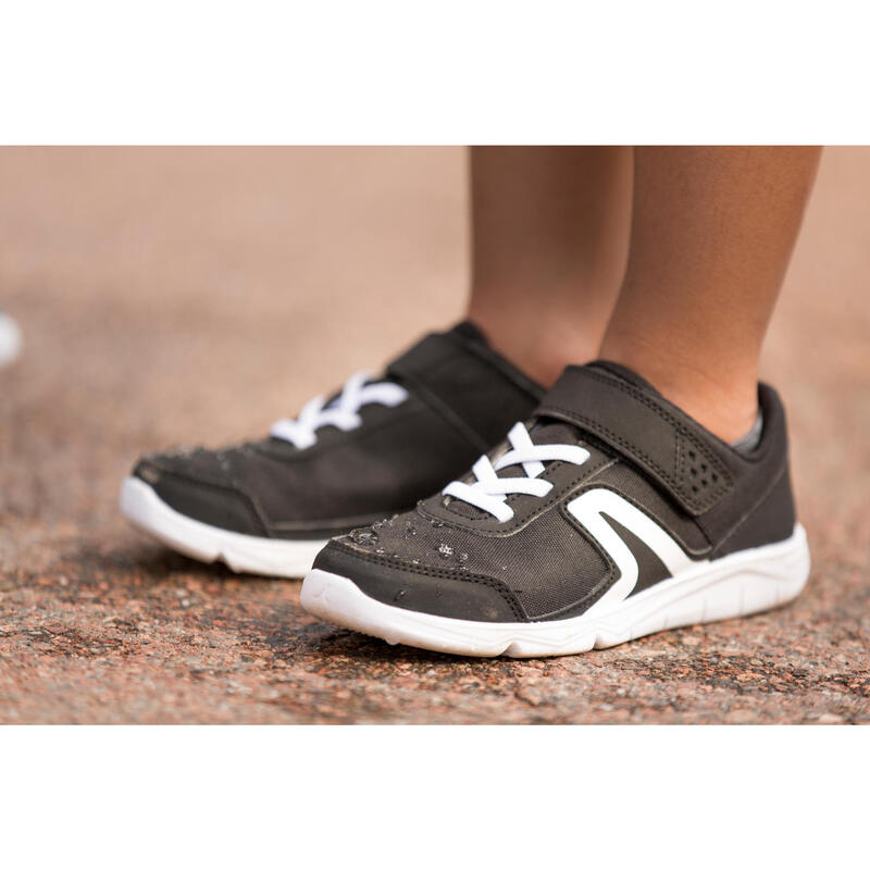 Zapatilla marcha con tira adherente Niños PW 100  negro