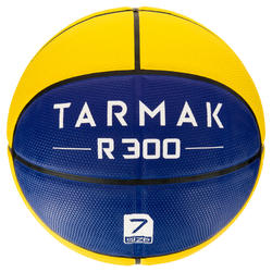 Ballon de basket homme R300 taille 7 jaune bleu. Résistant. A partir de 12 ans.