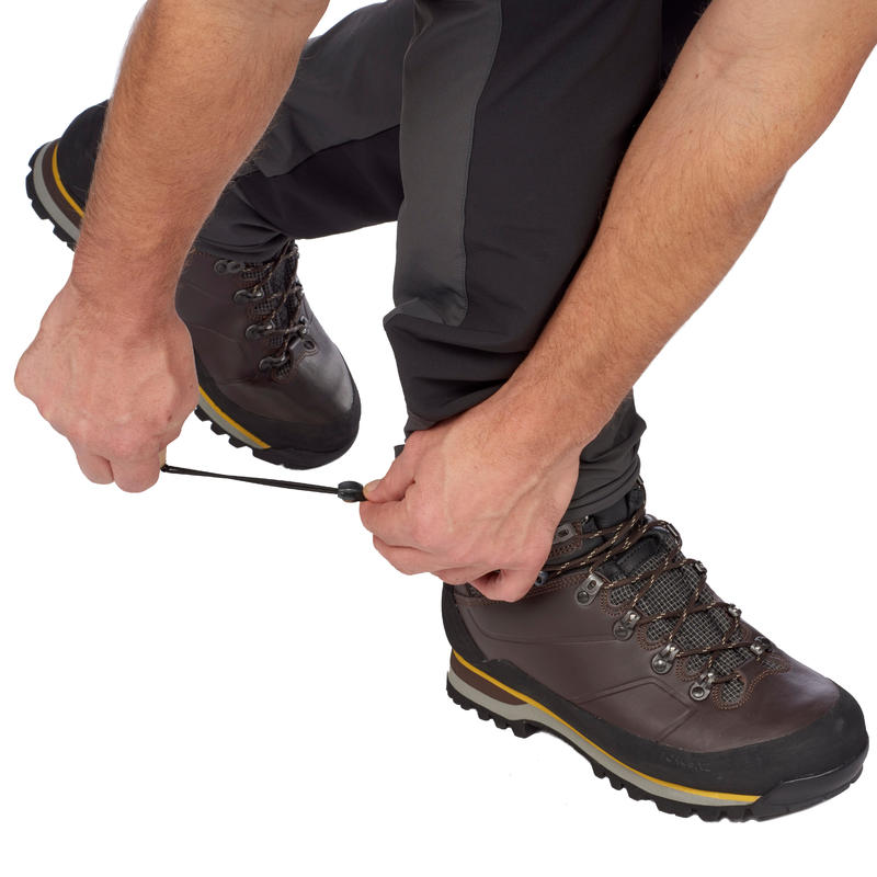 กางเกงขายาวผู้ชายสำหรับการเทรคกิ้งบนภูเขารุ่น TREK 900 (สีเทาเข้ม)