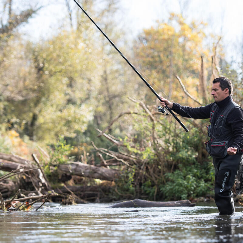 a man throwing his fishing line into the water