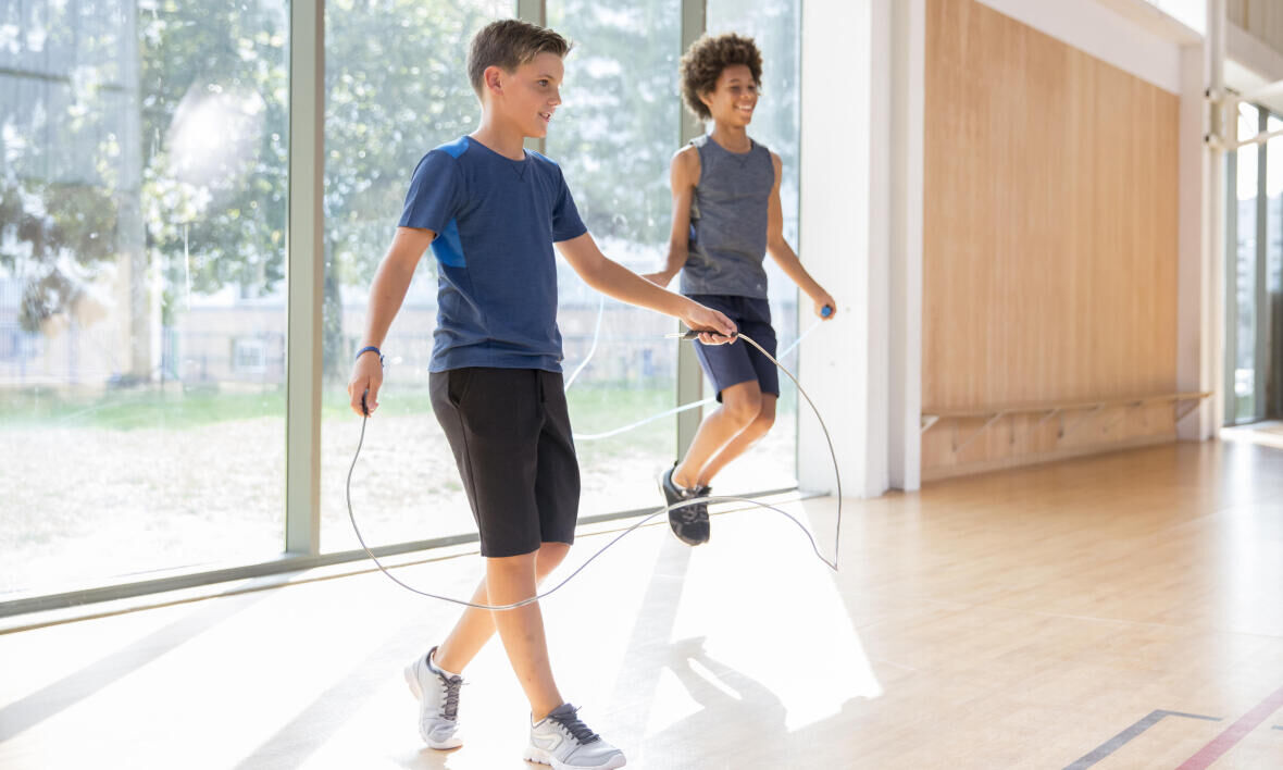 Two boys skipping rope