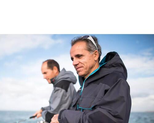 Two people fishing in the sea