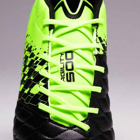حذاء مرن طويل 500 FG للكبار لملاعب النجيل الصناعي- أسود/أصفر
