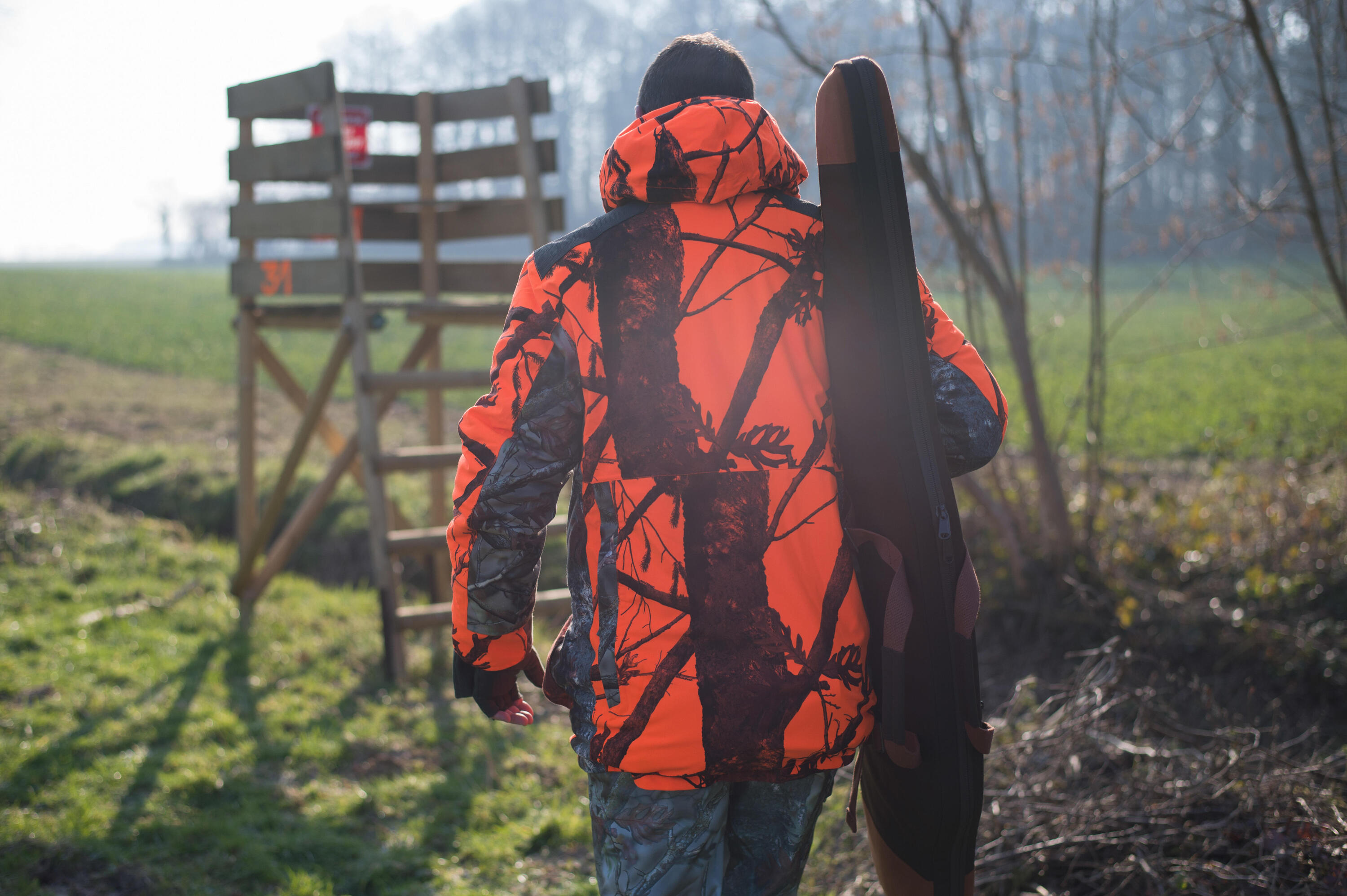 Jagdjacke Regenjacke 500 warm geräuscharm Camouflage/orange  12/13