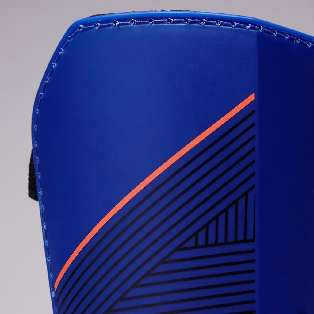 Píšťalové chrániče F140 na futbal (odnímateľný chránič členka) modro-oranžové