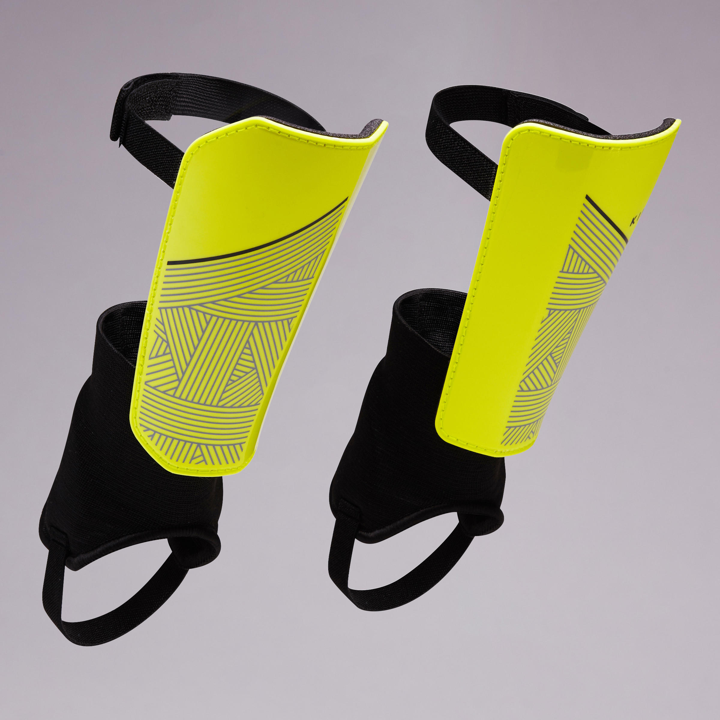 

Kids' Football Shin Pads F140. Yellow/Black. -  By KIPSTA | Decathlon, Black/yellow