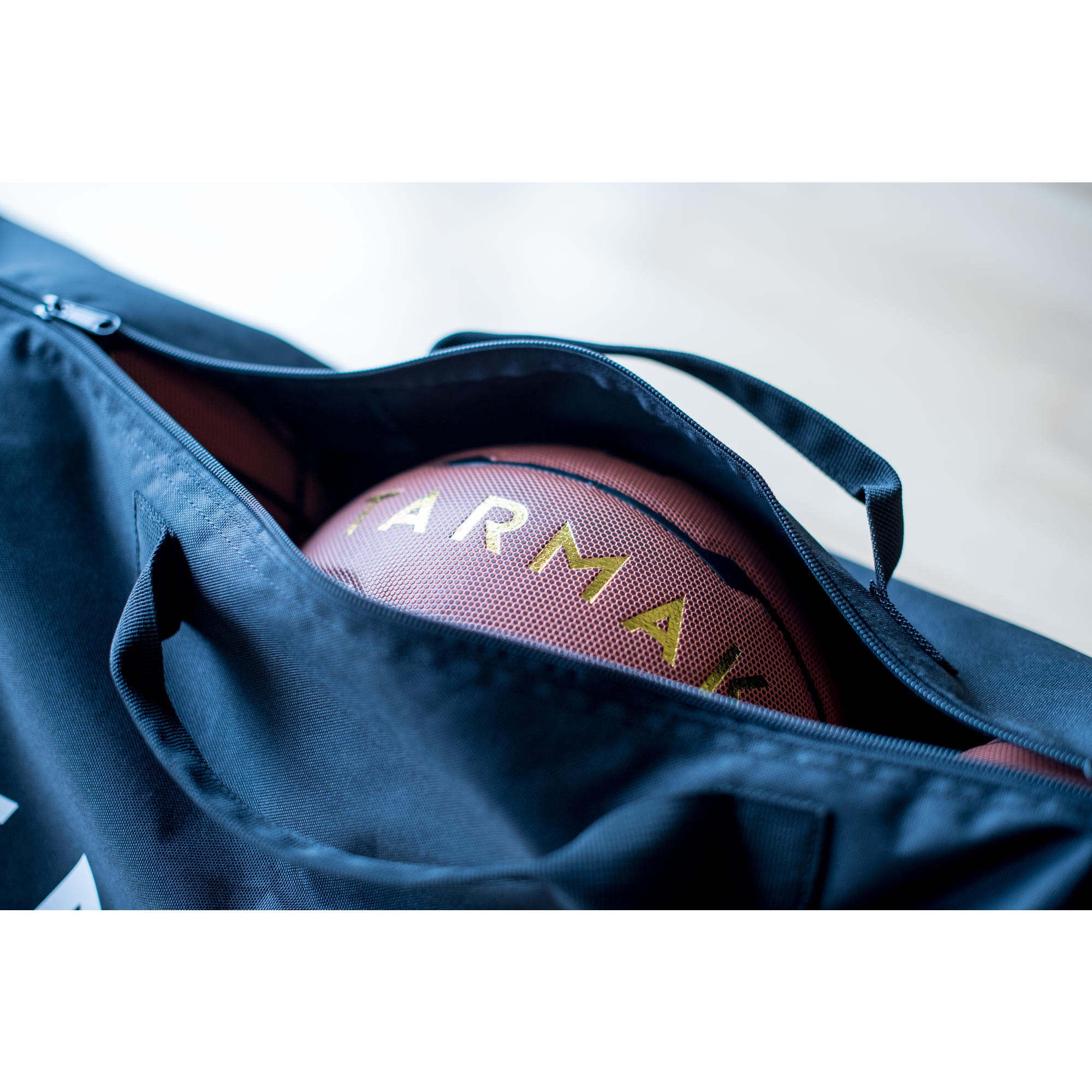 Durable basketball bag for carrying up to 5 balls in sizes 5 to 7.