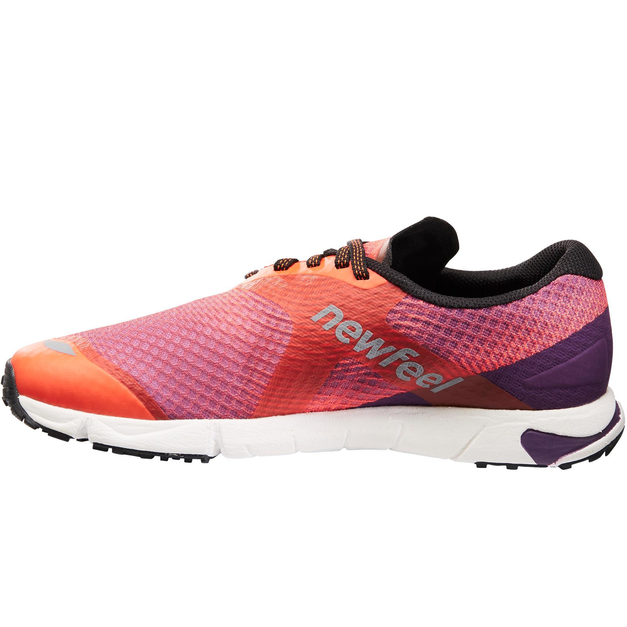 RW 900 athletic walking shoes in purple and orange