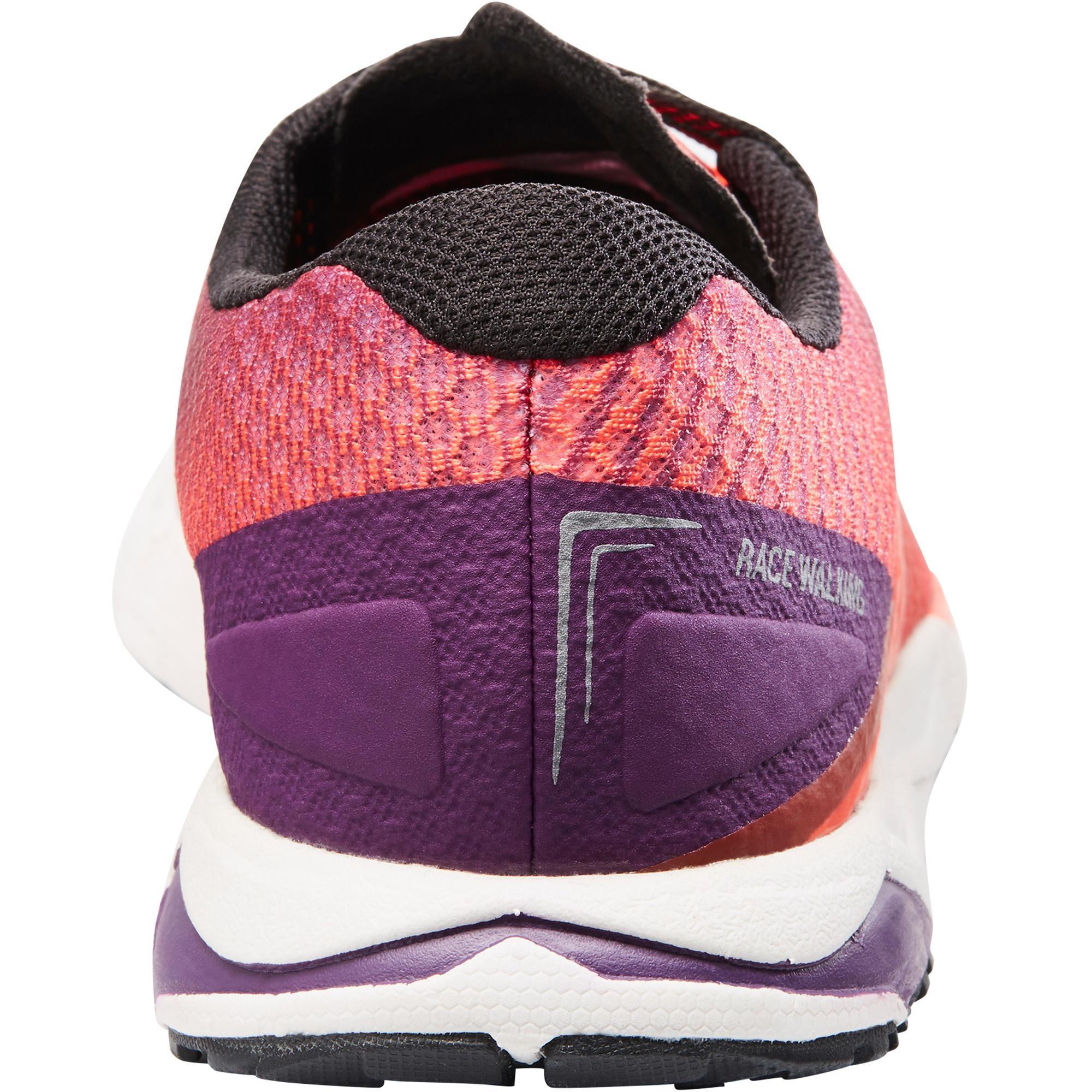 RW 900 athletic walking shoes in purple and orange