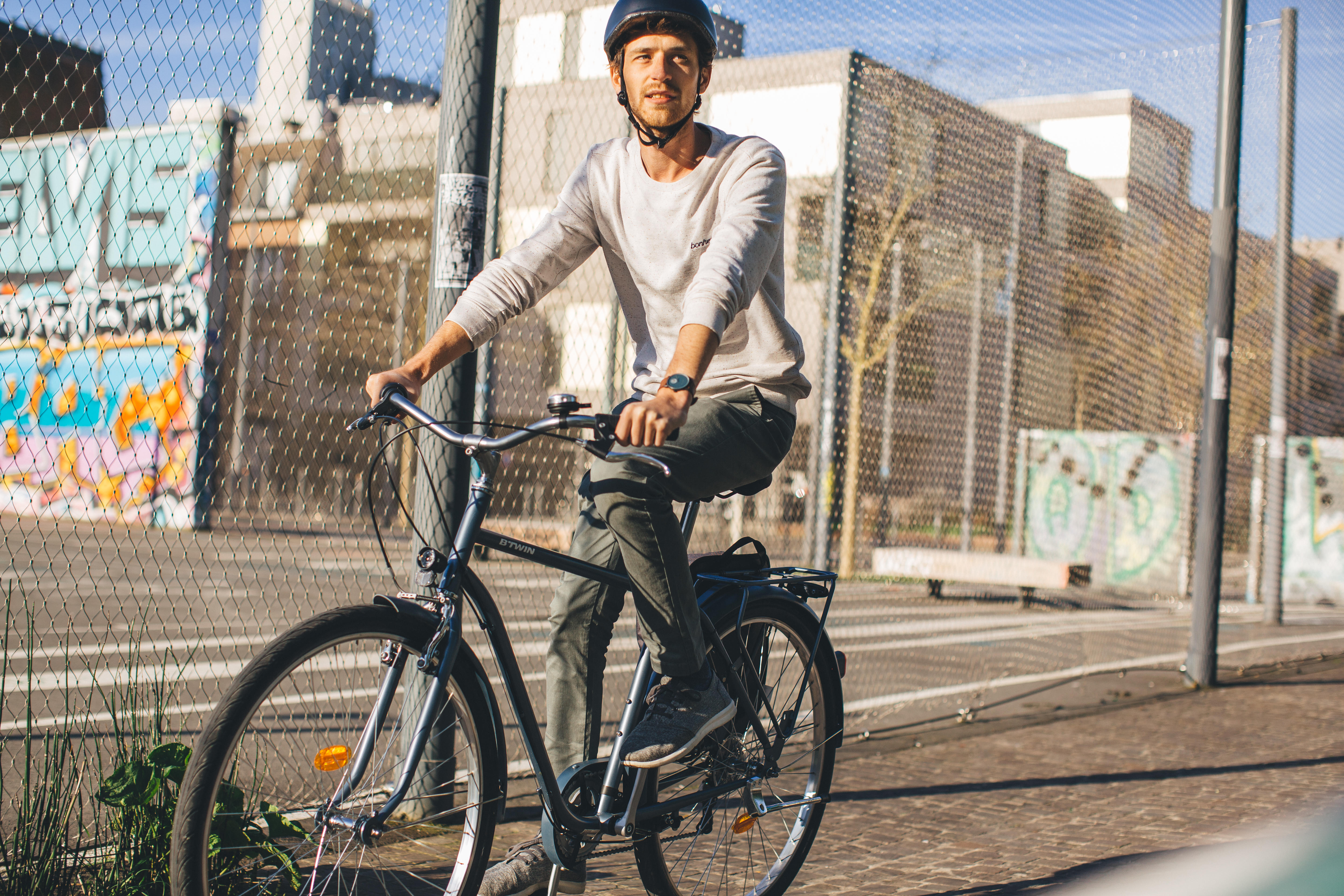 Man riding a commuter bike in the city