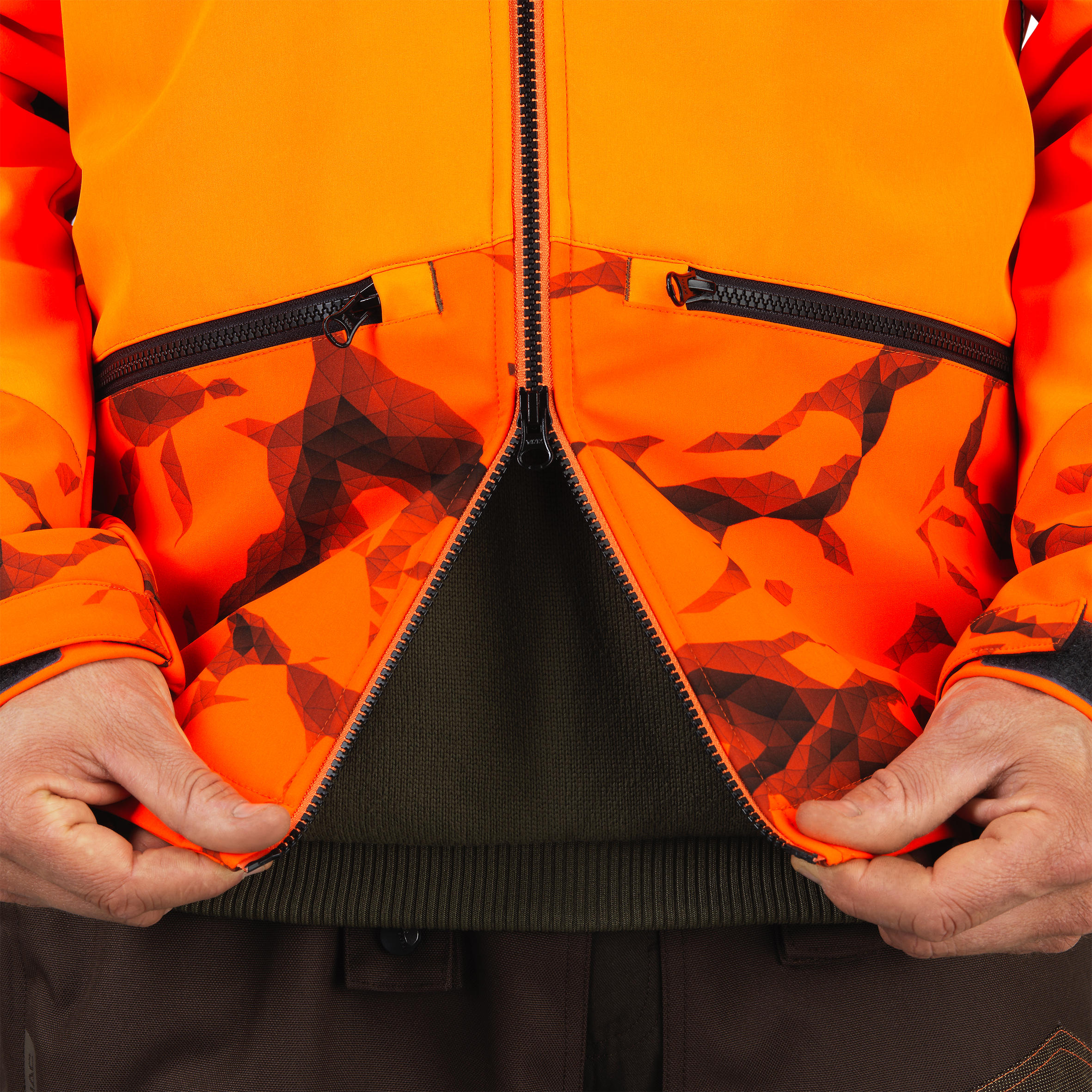 Lovecká softshellová bunda 500 oranžová fluo 12/20