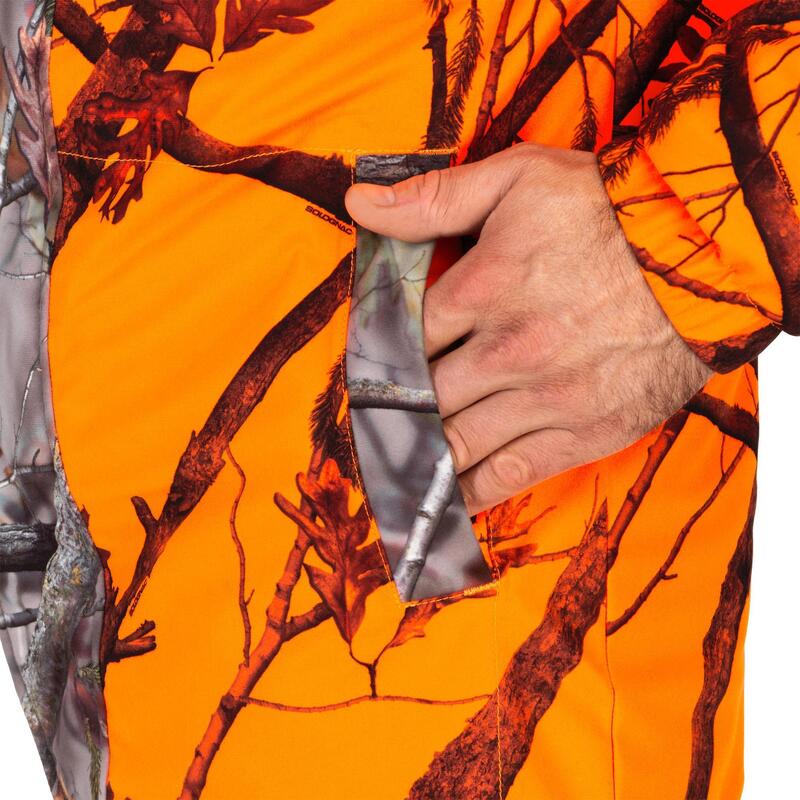 Jagdjacke Regenjacke 100 warm geräuscharm Camouflage/orange 