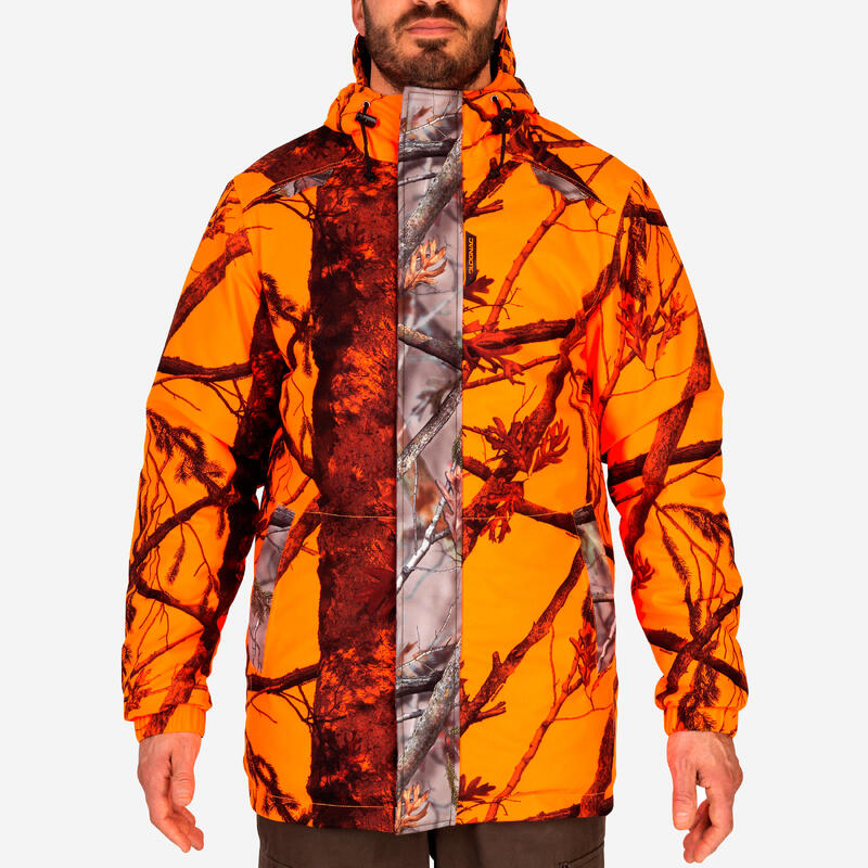 Chaqueta caza 100 Cálida impermeable camuflaje Solognac Hombre naranja fluo