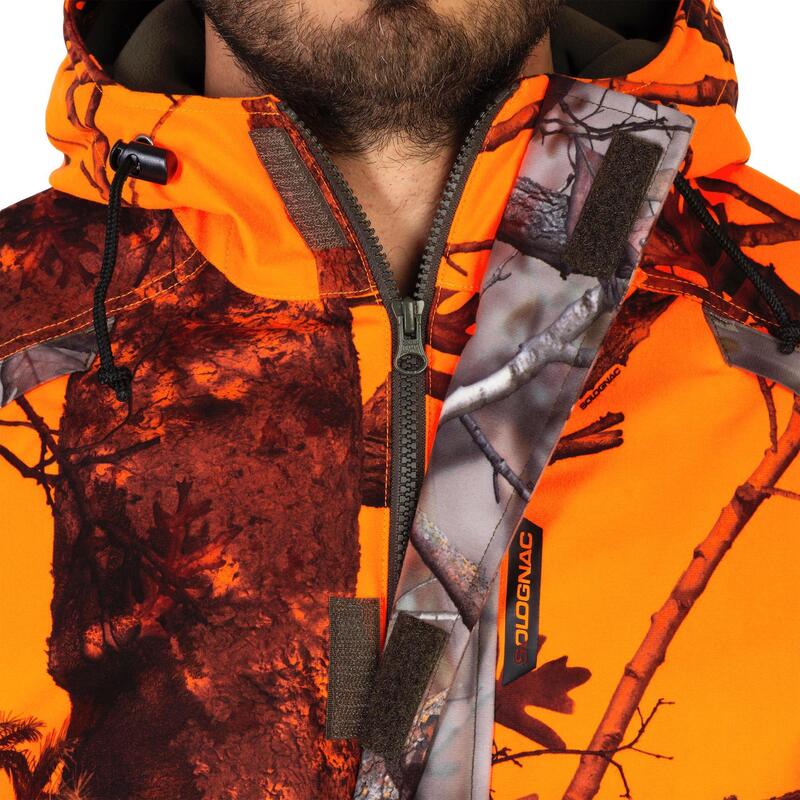 Chaqueta caza 100 Cálida impermeable camuflaje Solognac Hombre naranja fluo