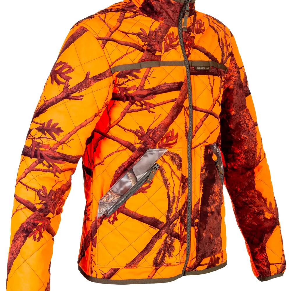 Veste camo fluo d'un coté et camo forêt de l'autre, chaude et silencieuse.