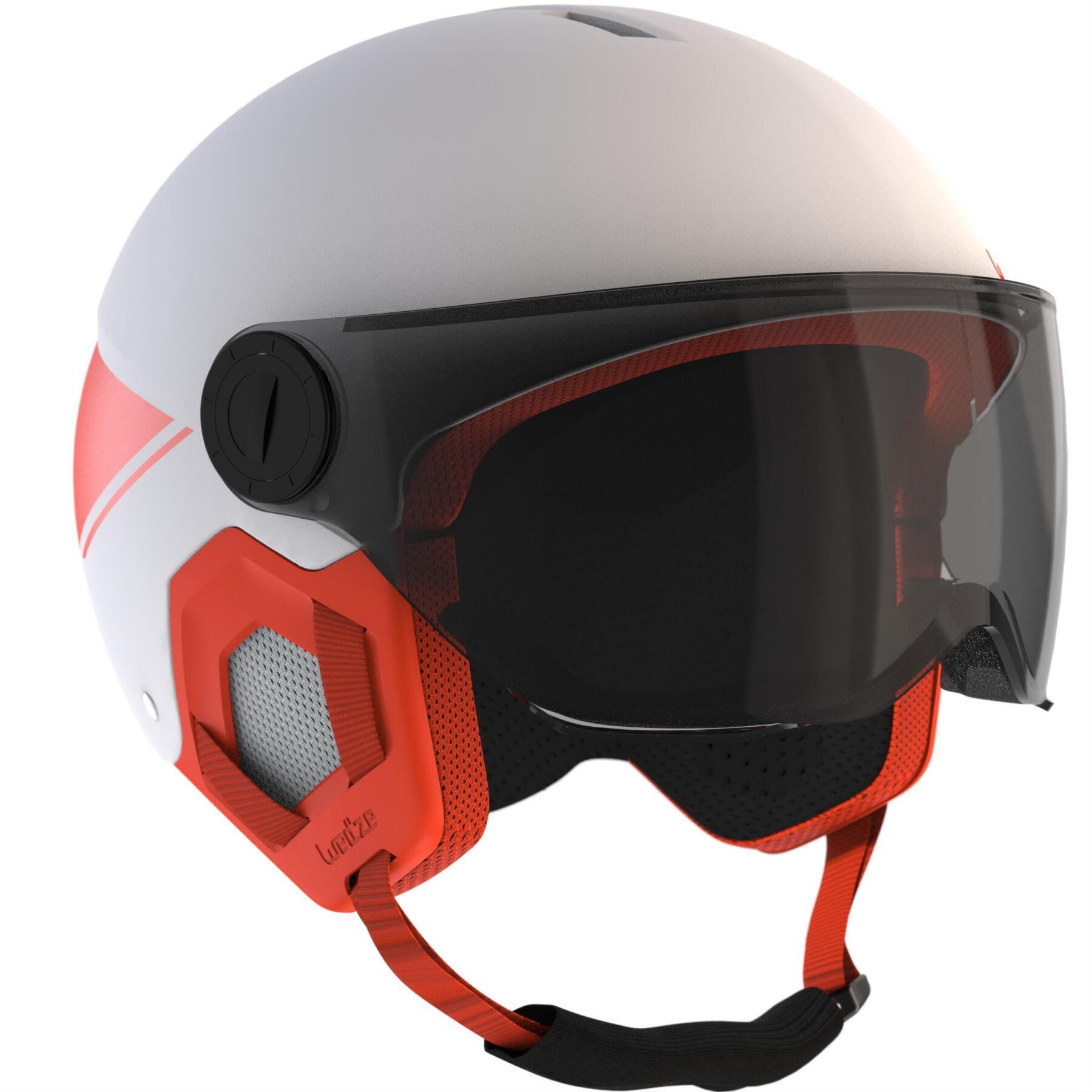 piste skiing goggles and helmet