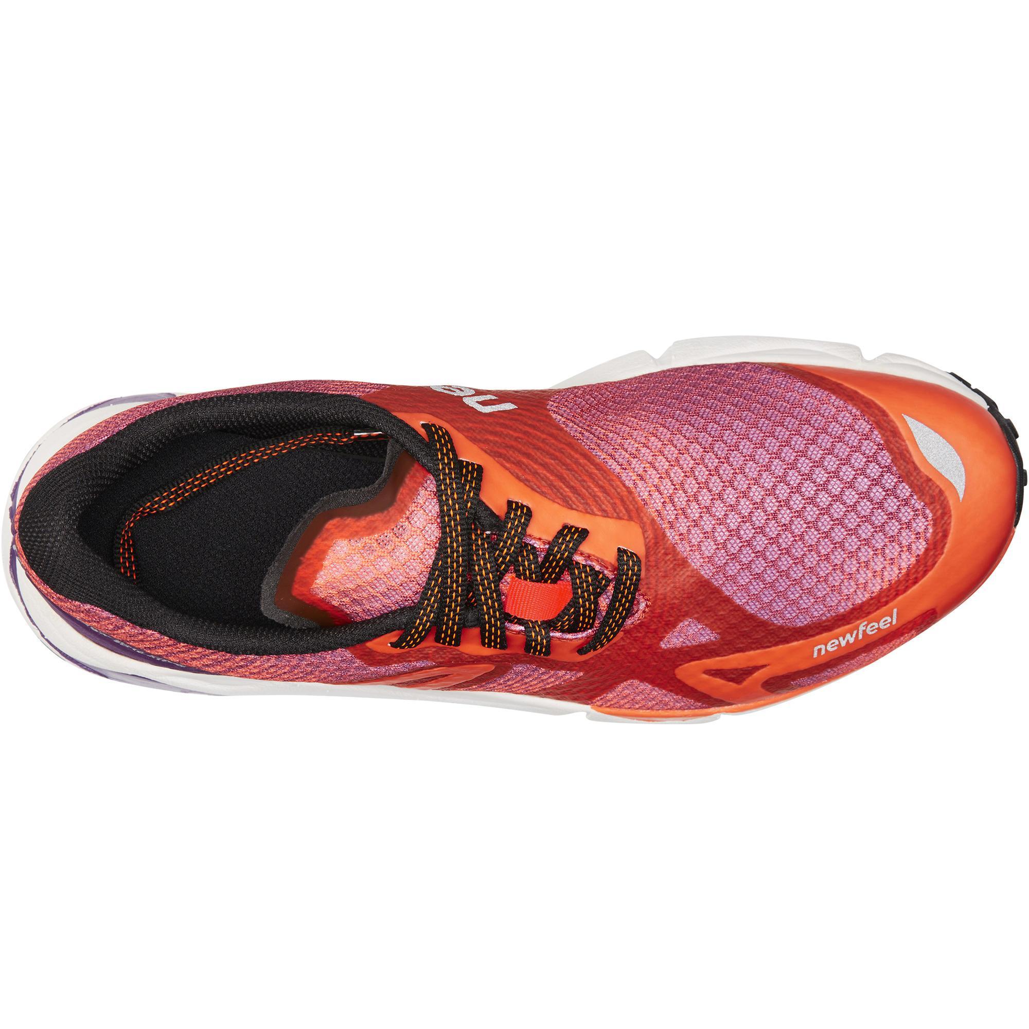 RW 900 athletic walking shoes in purple and orange