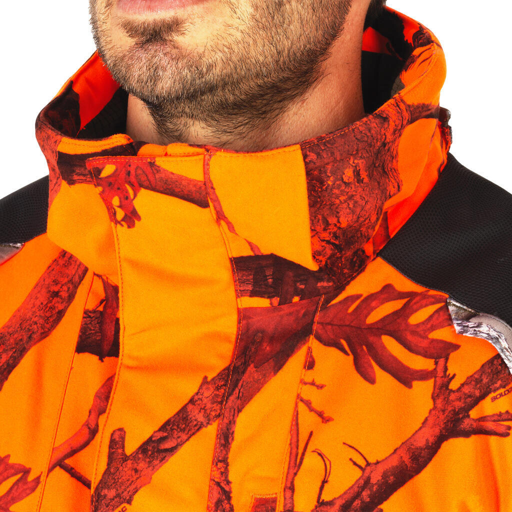 Jagdjacke Regenjacke 500 warm geräuscharm Camouflage/orange 