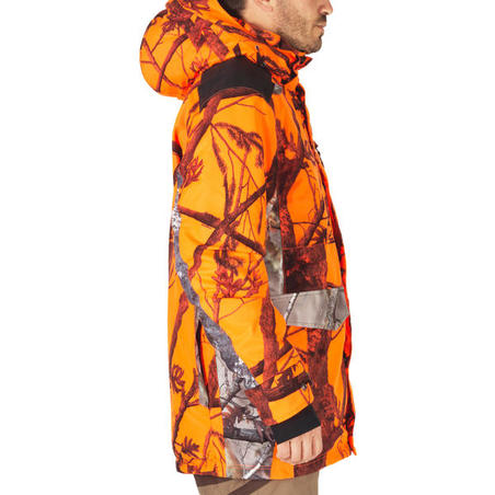 Fluokamuflažna tiha i topla vodootporna jakna za lov 500