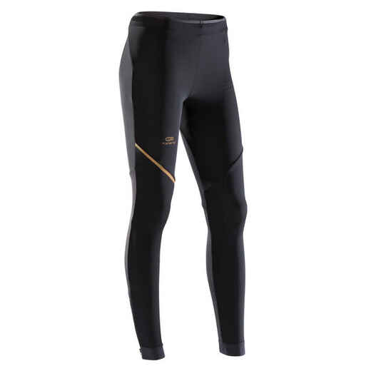 
      Kiprun Warm Women's Running Tights - Black Gold
  