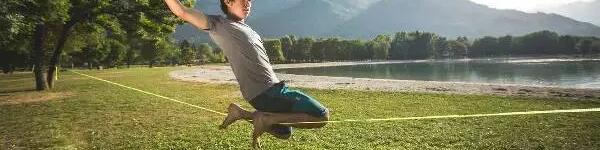 Kids slacklining outdoors