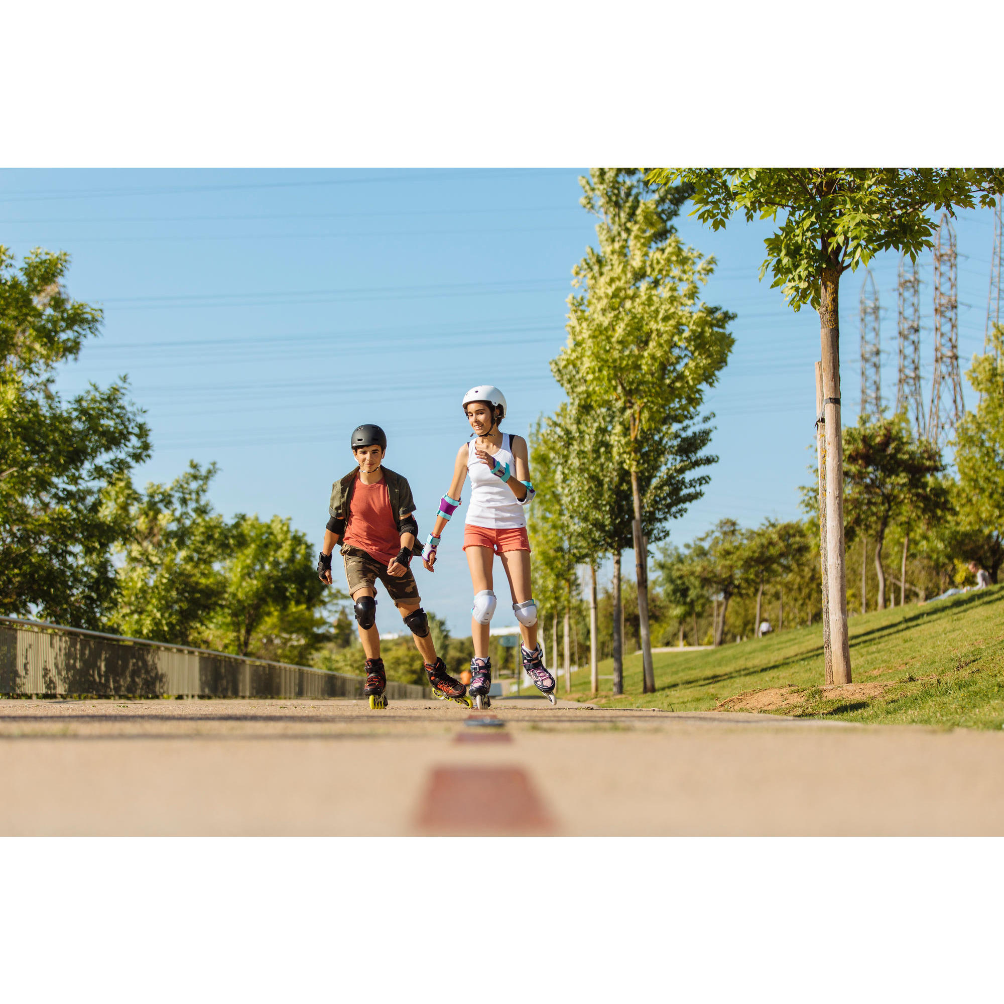 РОЛИКИ ДЕТСКИЕ FIT 5 РАЗДВИЖНЫЕ СИНЕ-РОЗОВЫЕ OXELO