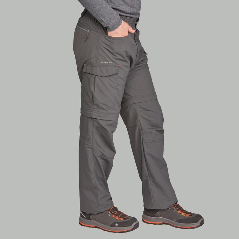 กางเกงขายาวผู้ชายแบบถอดขาได้สำหรับเทรคกิ้งบนภูเขารุ่น TREK 100 (สีเทาเข้ม)