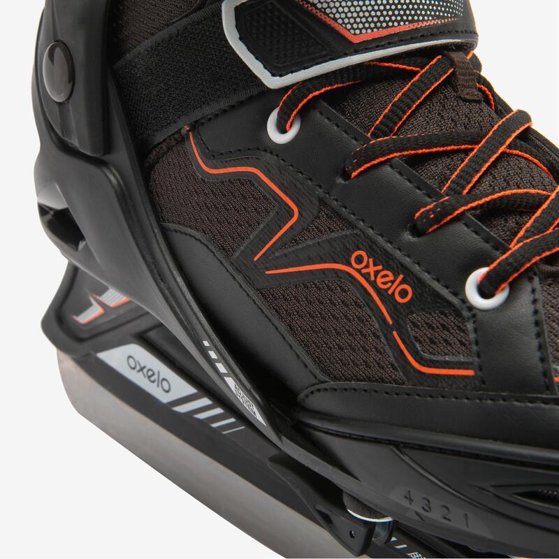 PATINES SOBRE HIELO FIT100 JR NEGRO/NARANJA