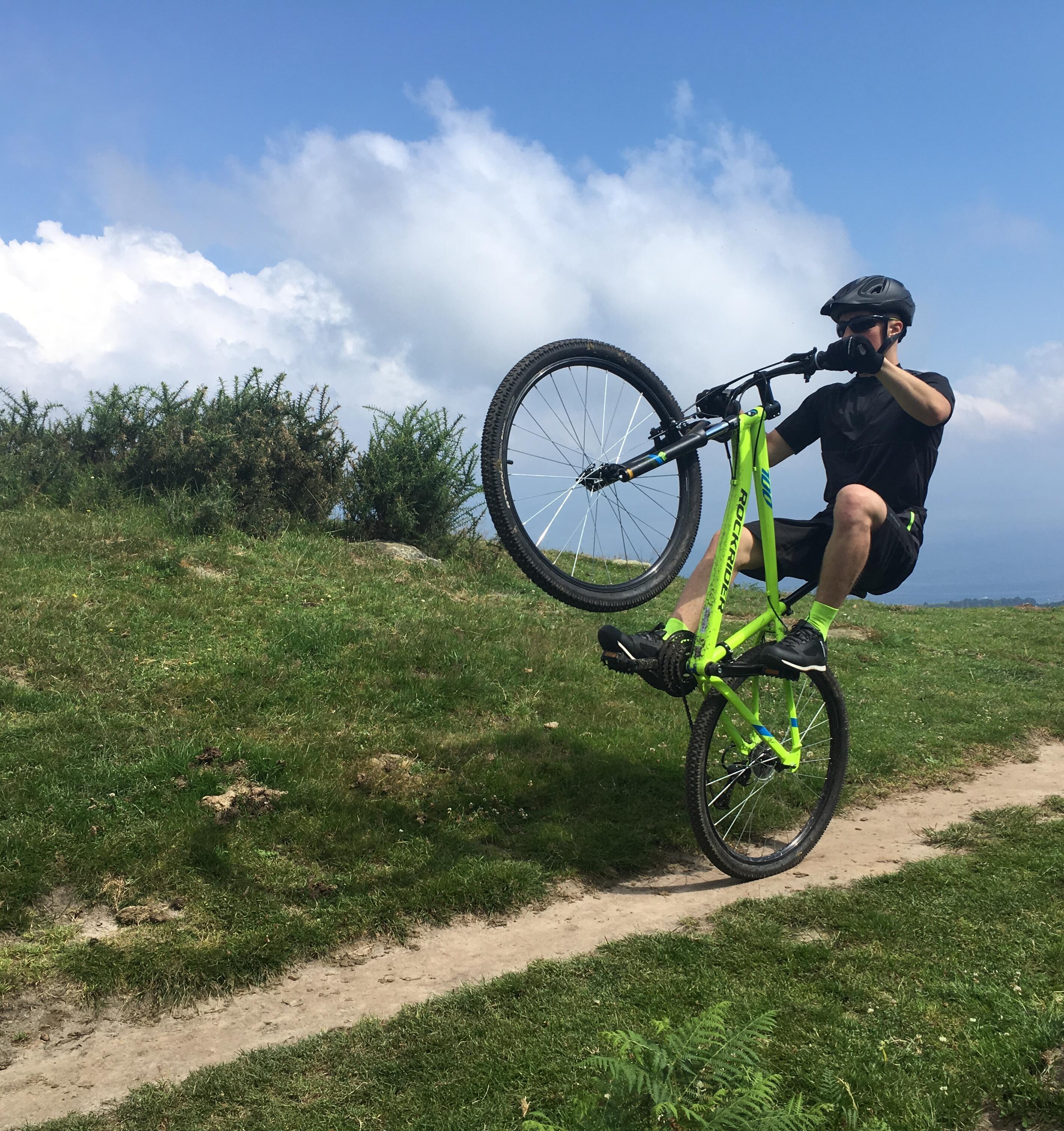 wheelies and buckling of the ROCKRIDER ST 100 mountain bike's wheels