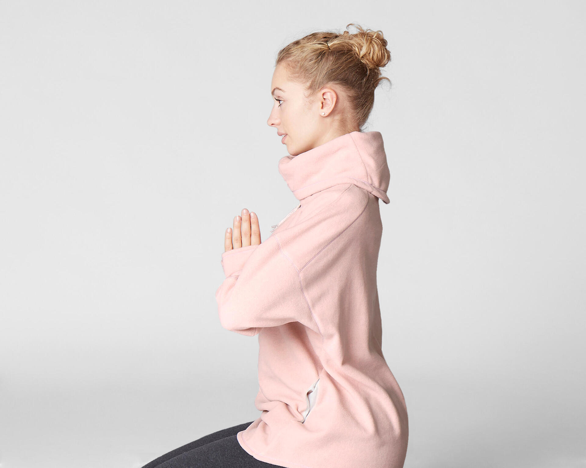 Woman with her yoga relaxation sweatshirt