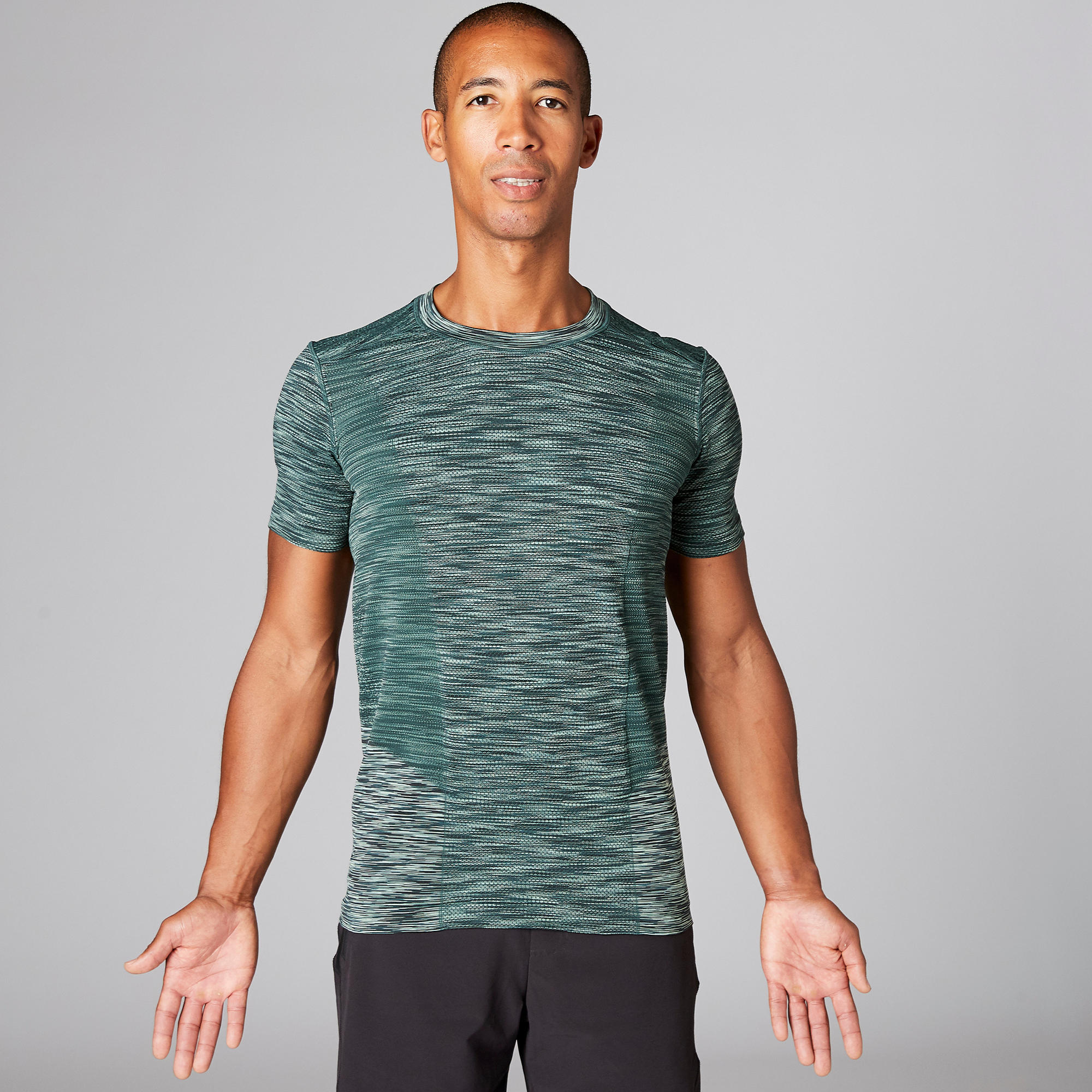

Seamless Half-Sleeved Yoga T-Shirt - Mottled Green -  By DOMYOS | Decathlon
