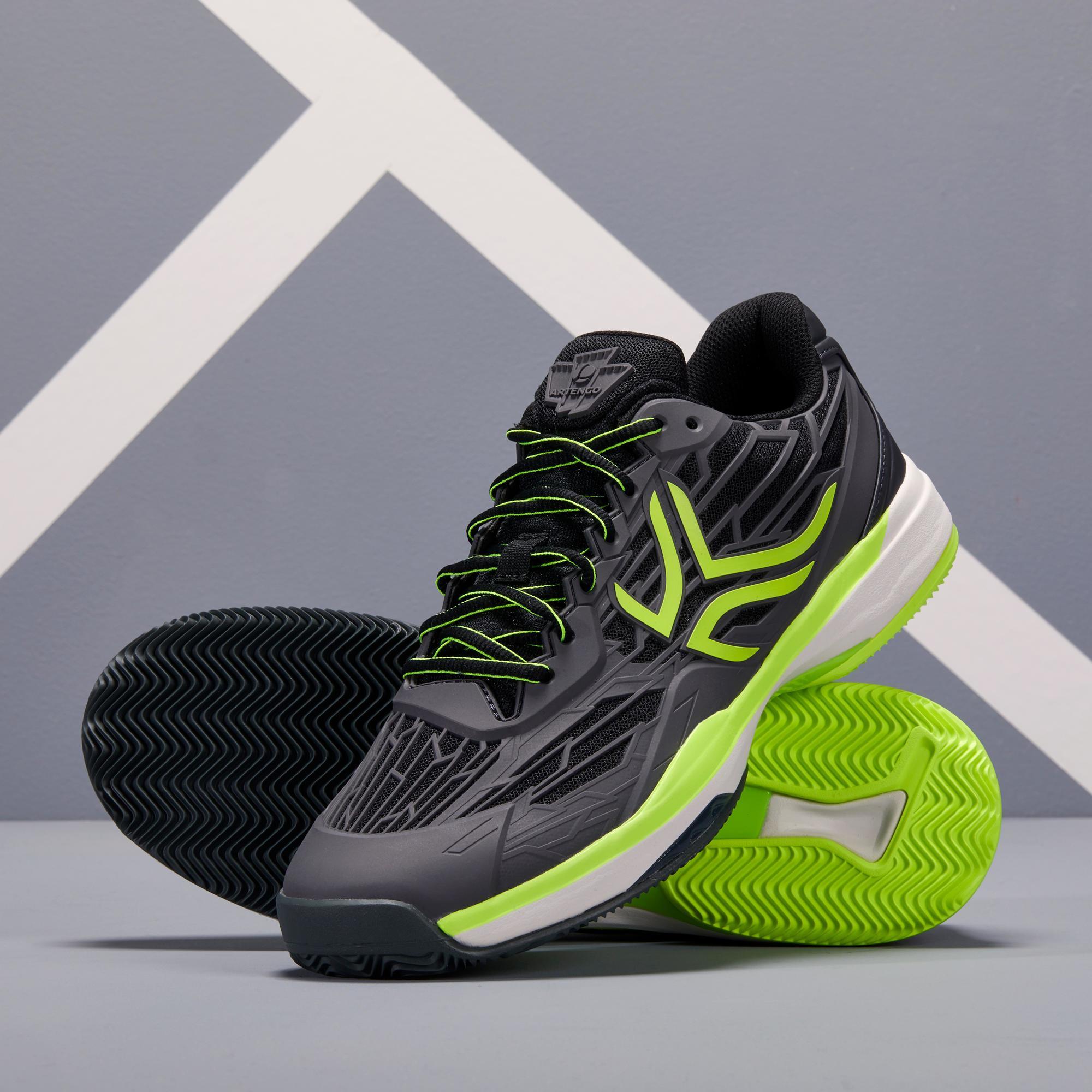 black and yellow athletic shoes