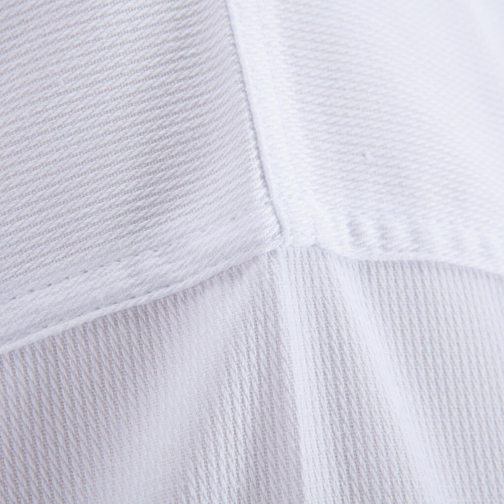 Uniforme de taekwondo Outshock 500 blanco