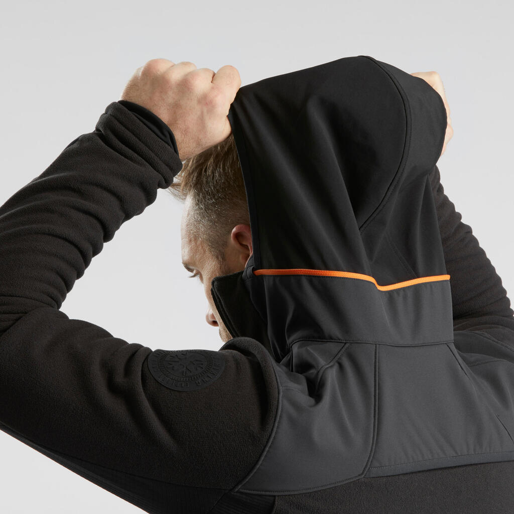 Chamarra cálida de tejido polar para senderismo negra para hombre SH500 MOUNTAIN