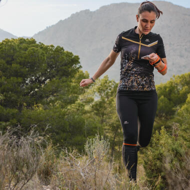 Woman runs in south forest
